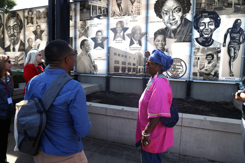 Community leader Julialynne Walker conducts a tour of Near East Side landmarks.