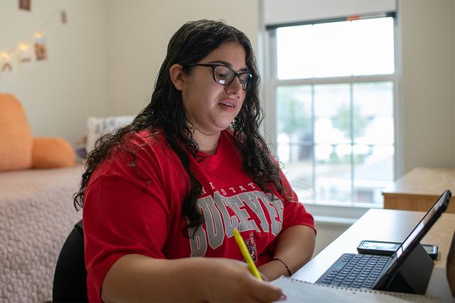 Young Ohio State student works at a computer