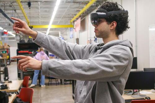 A student uses a VR headset