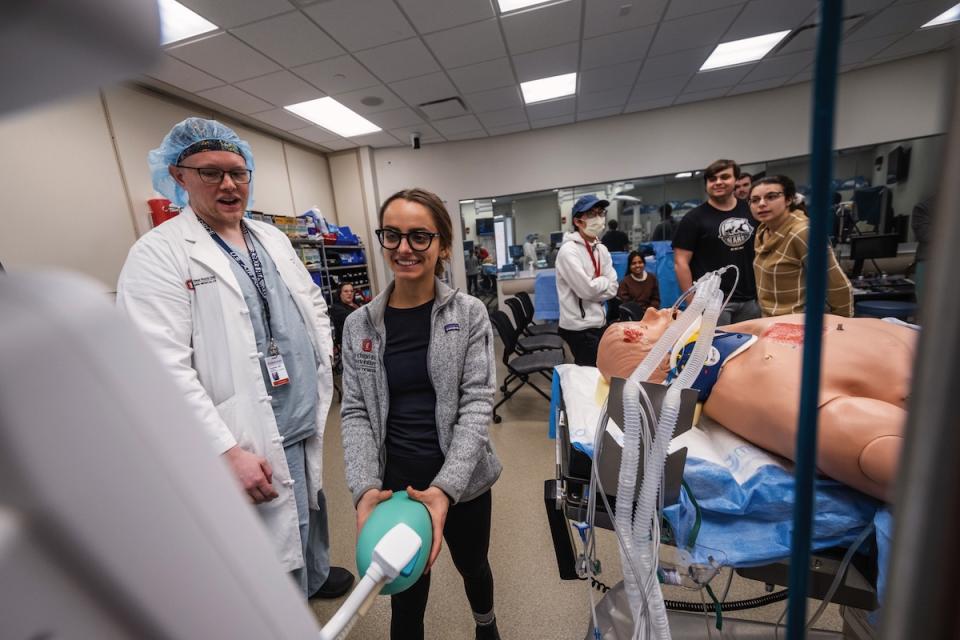 Modern learning environment setting on the 6th floor of Prior Hall where first year medical students learn a Pulmonary/Physiology lesson in an emergency operating room and intensive care room scenario. Students were to assess a simulated emergency scene where a manikin had been involved in a scooter accident.