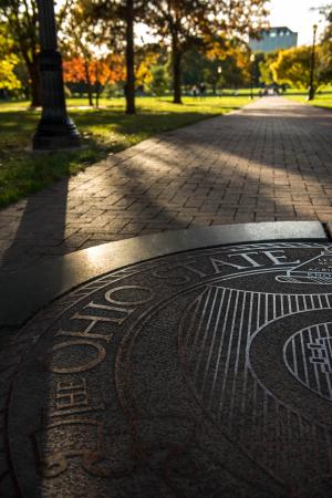 Seal of The Ohio State University in the Oval at Ohio State.